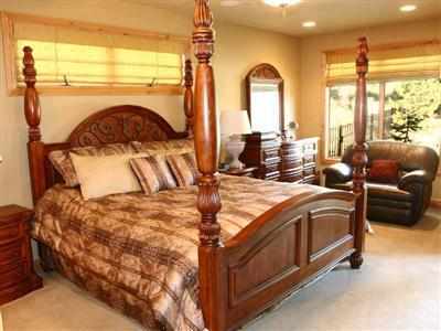 master suite with views of central or woods at The Reserve in Broken Top