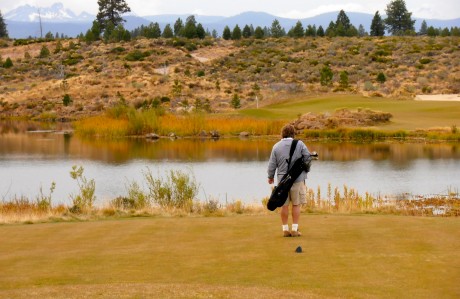 "Rory" Kohlmoos contemplats the third hole carry at Tetherow golf club