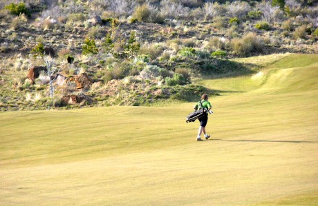 Bend realtor, John Kohlmoos, casually strolls the fairway at Tetherow Golf club . . . another 280 yard drive down the middle!
